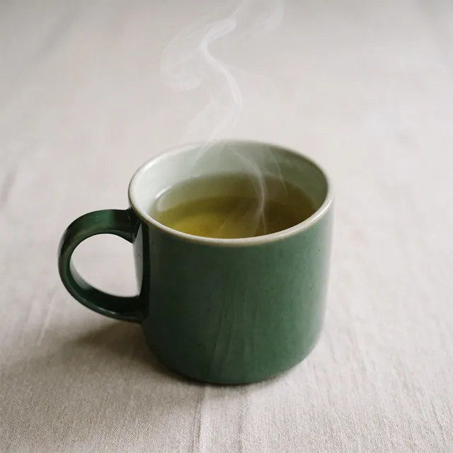 Person practicing calming techniques for anxiety relief