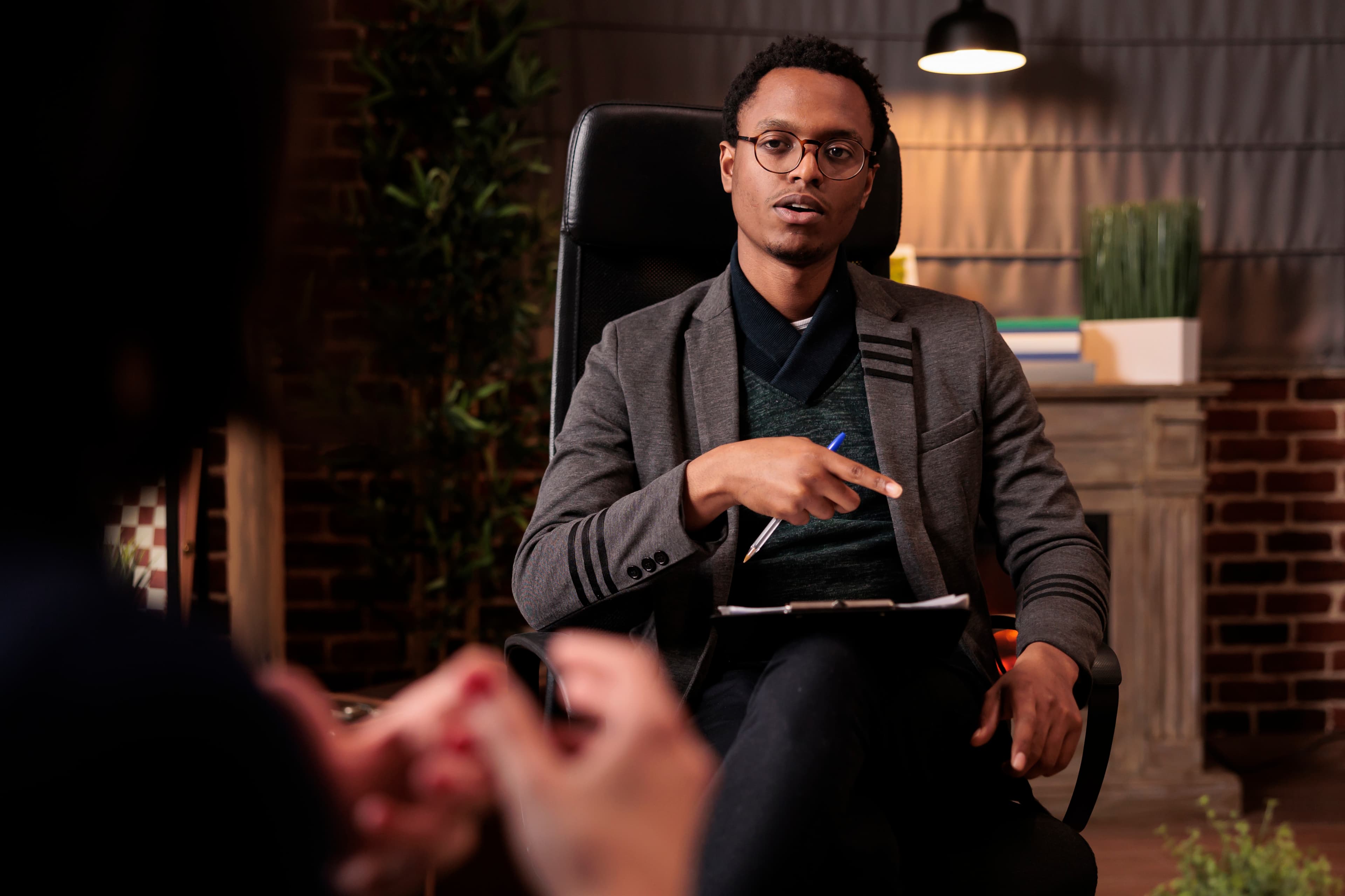 Man leading a counseling session