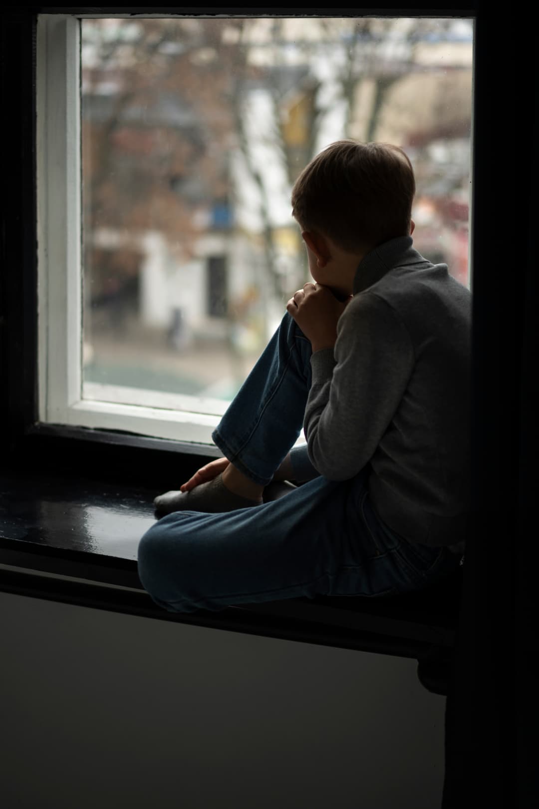 sad-person-looking-out-the-window.jpg